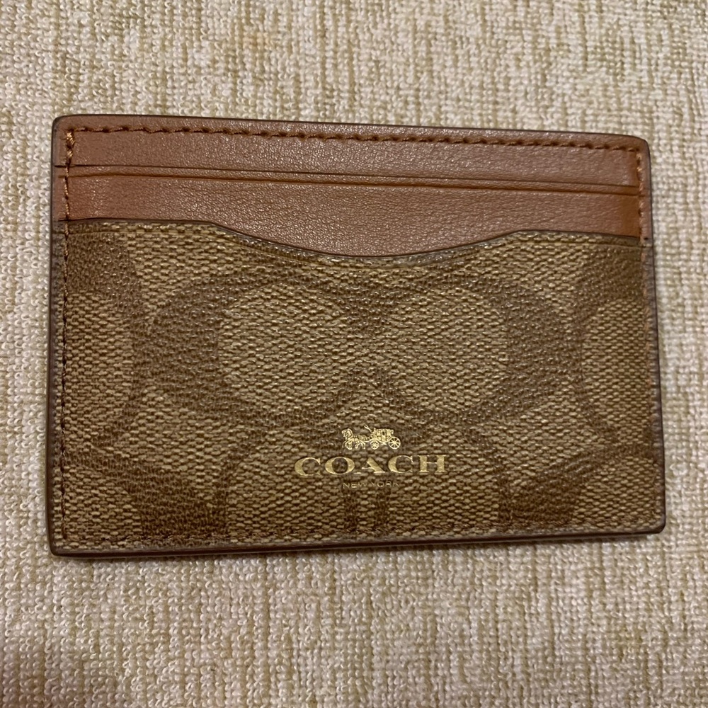 Authentic Coach card holder.